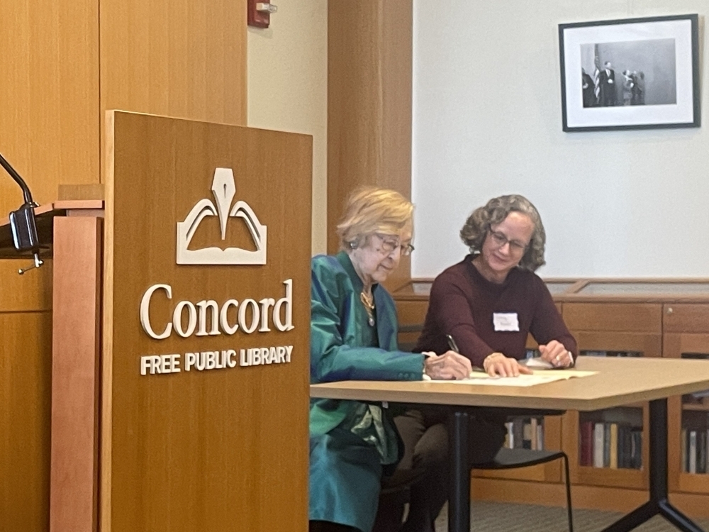 Mrs. Susan Curtin signing